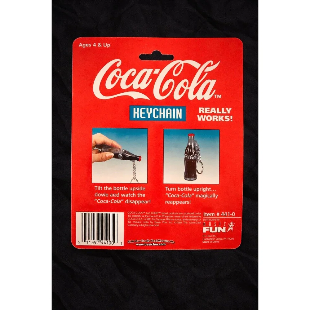Vintage Coca-Cola Disappearing Bottle Keychain NIB Sealed 1999 - Picture 2 of 2